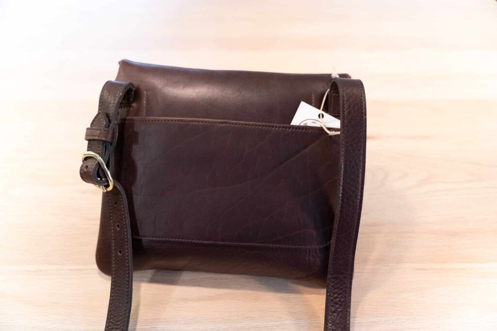 Full length leather pocket on back of the Bison purse.