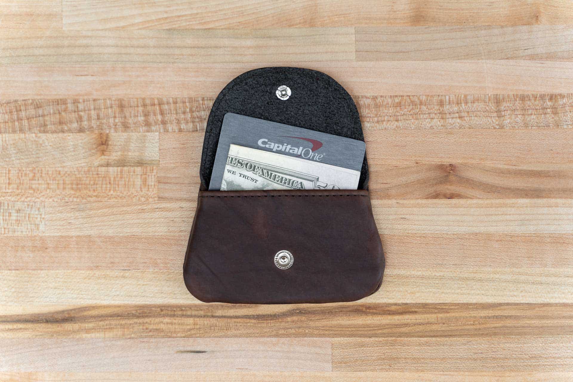 Male coin outlet pouch