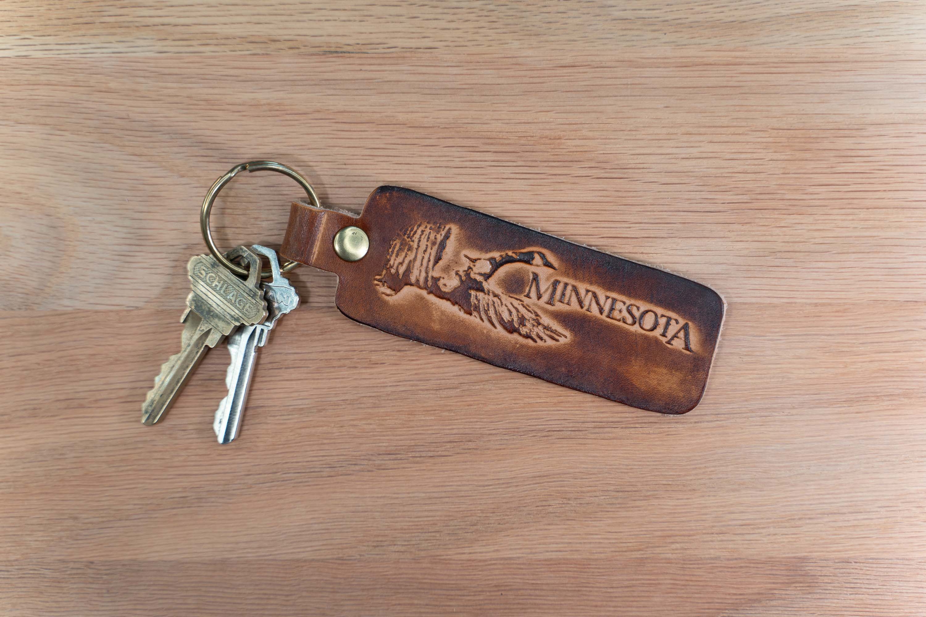 Minnesota Keychain - Full Grain Leather - Flying Goose Design - Sunburst Minnesota Keychain - Full Grain Leather - Flying Goose Design - Sunburst