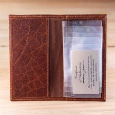 Inside of the red Shrunken Bison Leather Checkbook Cover