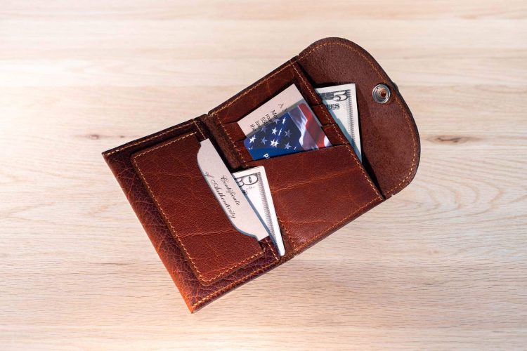 Women's Mini Wallet holding cards and cash
