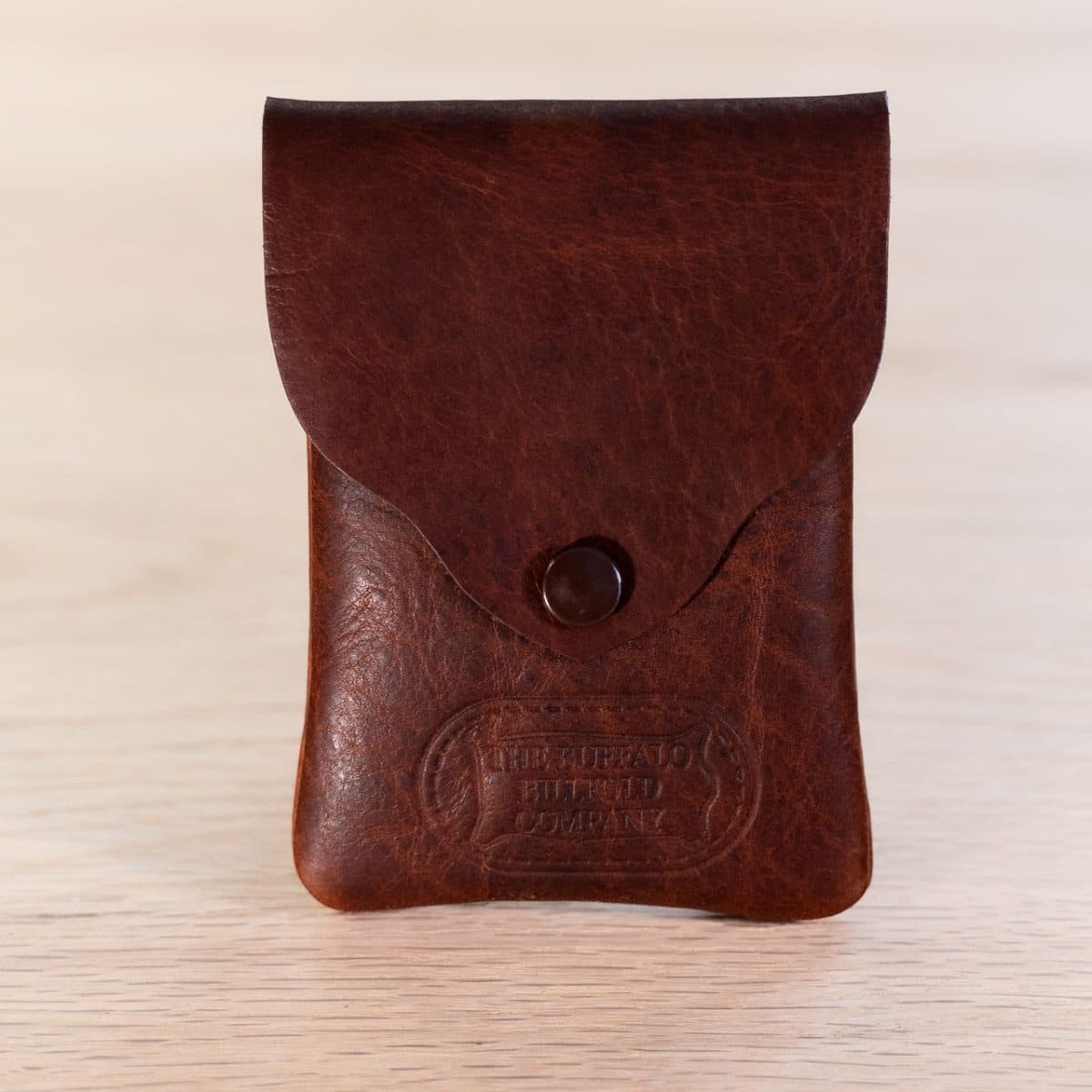 https://buffalobillfoldcompany.com/wp-content/uploads/2022/12/Vertical-Business-Card-Holder-Red-Leather-1200x1200-cropped.jpg