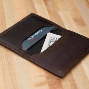 This compact promotional leather card case holds credit cards and bills.