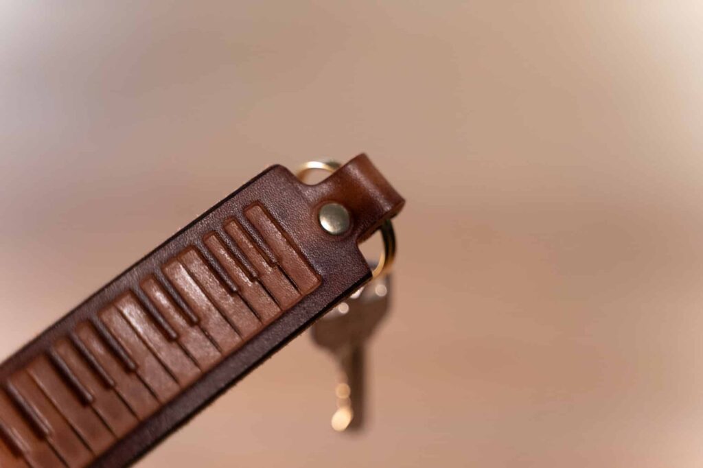 Leather Piano Keychain Brass Rivet
