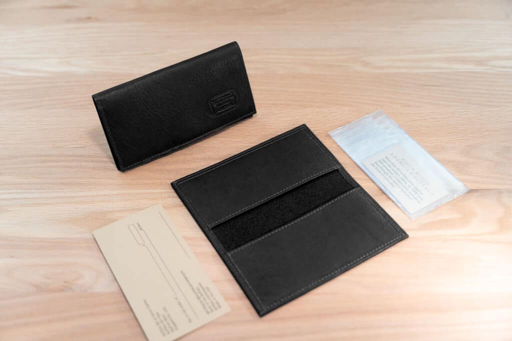 Black Full Grain Bison Leather Checkbook Cover With Card Card Slots On Left Side