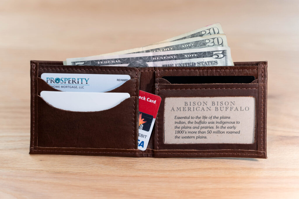 Three horizontal, top load, credit card slots with two more internal fold-line load slots