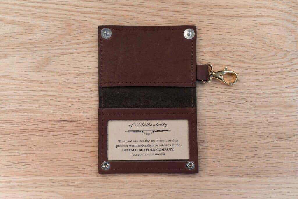Brown Leather Luggage Tag Featuring An Id Card Window, Two Brass Snaps, And Brass Clip, And An Extra Interior Leather Pocket