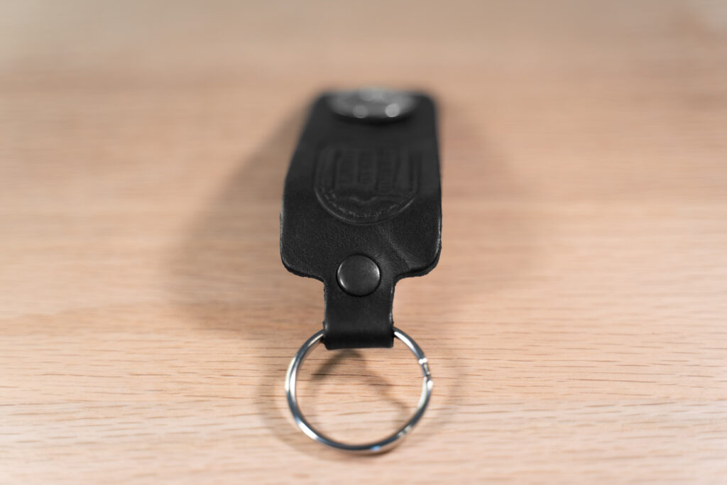 Strong Metal Rivet On Black Leather Keychain Strong Metal Rivet On Black Leather Keychain