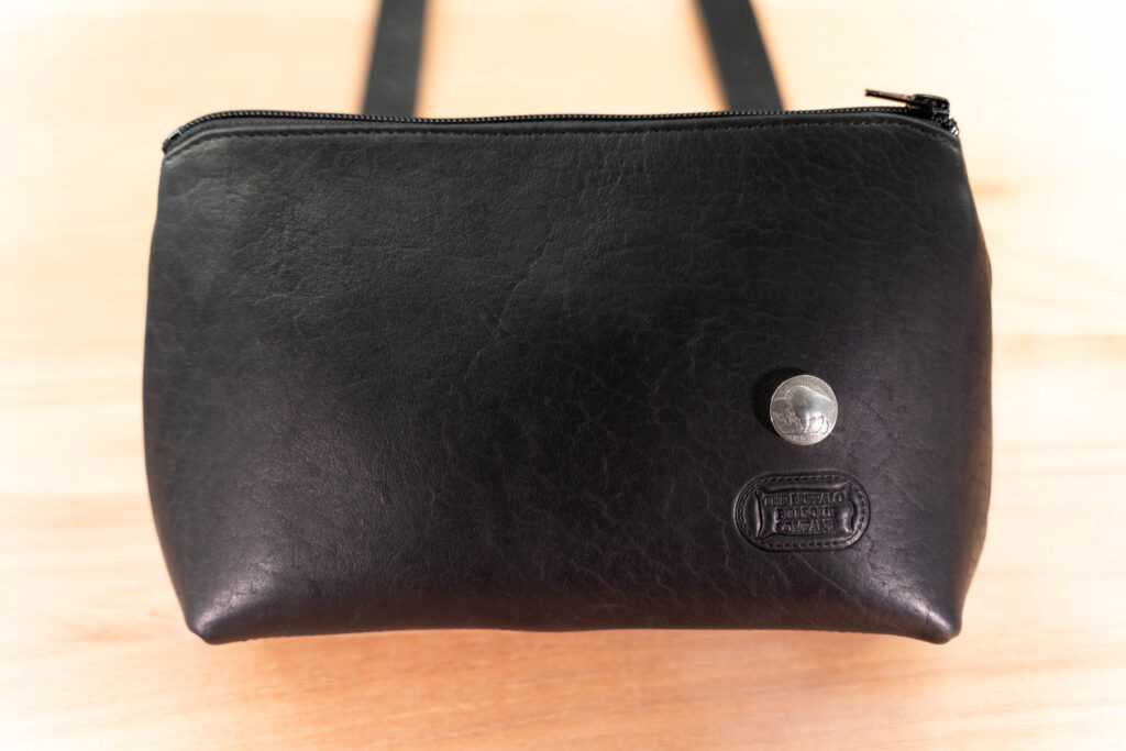 Front Of The Black Southern Prairie Crossbody Leather Purse Showing An Genuine Buffalo Nickel Front Of The Black Southern Prairie Crossbody Leather Purse Showing An Genuine Buffalo Nickel