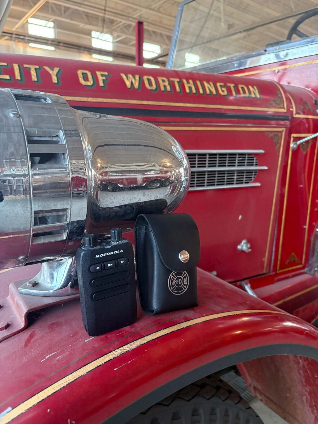 Motorola Minitor 7 Pager Next To Leather Pager Holder On A Red Fire Truck Motorola Minitor 7 Pager Next To Leather Pager Holder On A Red Fire Truck