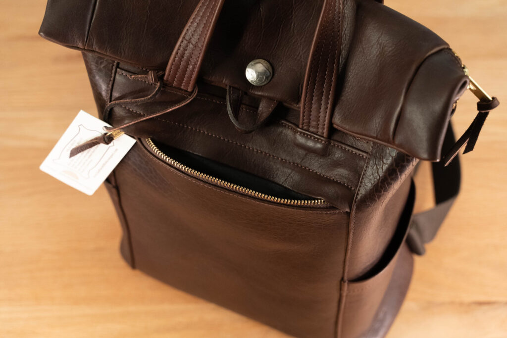 Northbound Backpack Front Zipper Pocket Open Front Zipper Pocket Open On Northbound Bison Leather Backpack