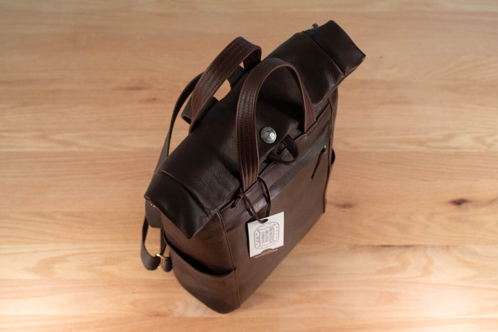 Northbound Backpack Left Side Profile Left Side Profile Of Northbound Bison Leather Backpack